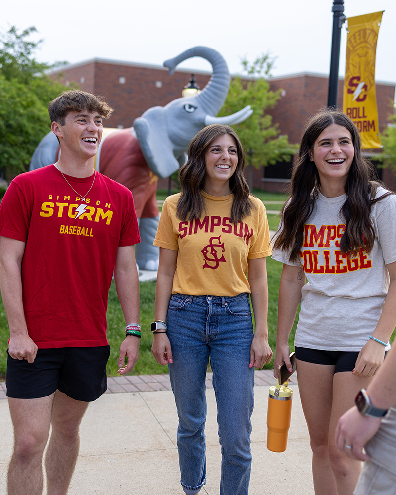 Students on Campus by Thunder statue