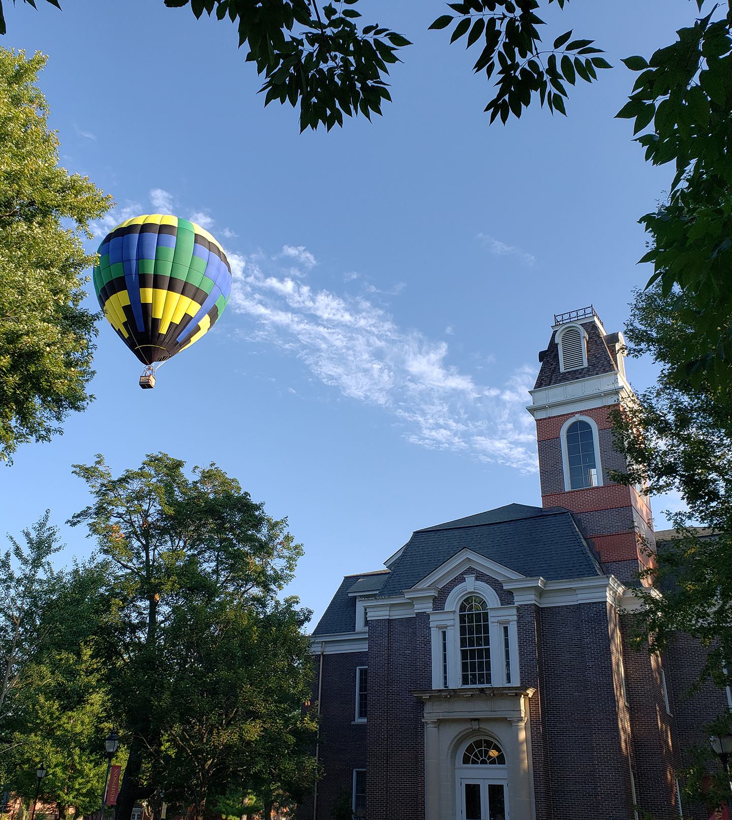 Hot air balloon over College Hall