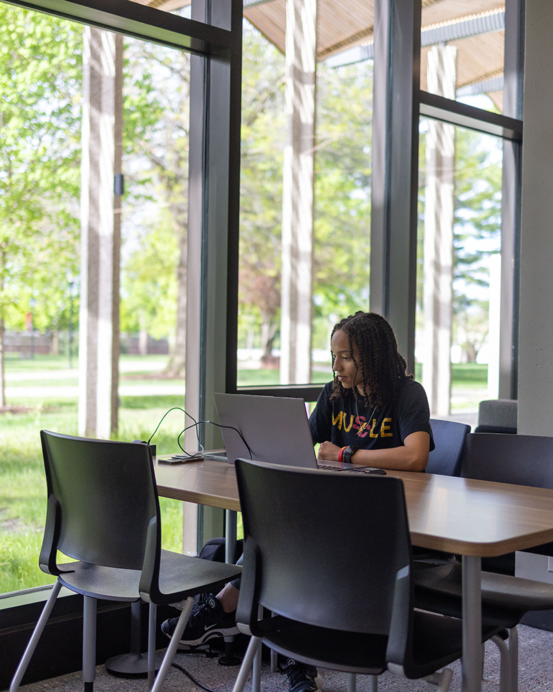 Simpson College student working online