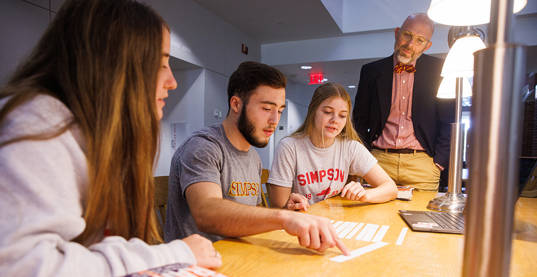 Faculty talking with students