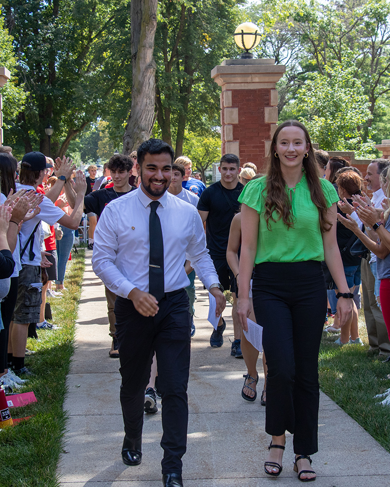 Students walking through the gates