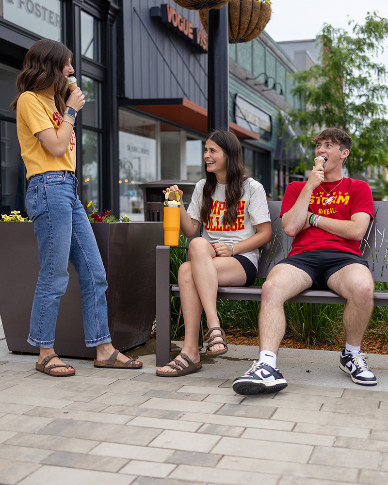 Students eating ice cream on the square