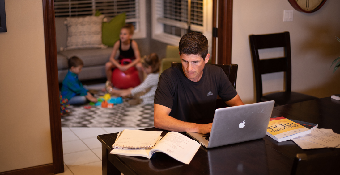 Adult learning with family in the background