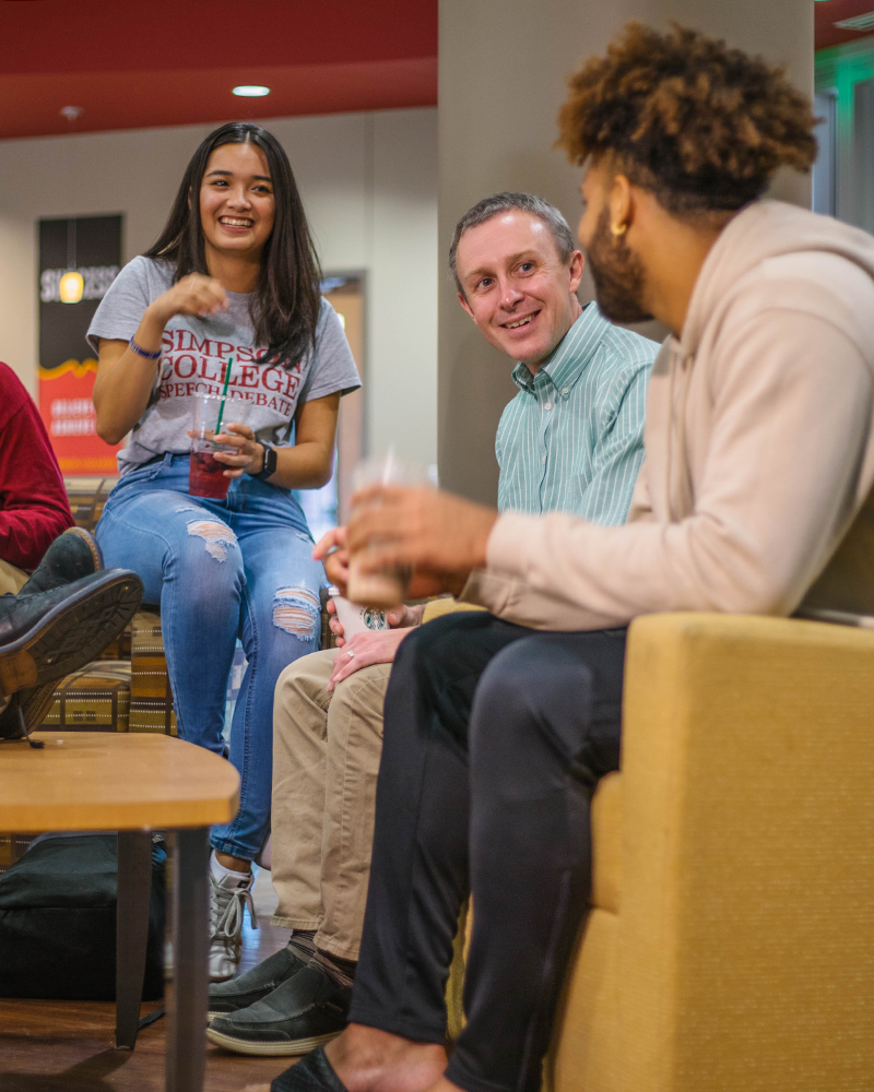 Professor talking with students