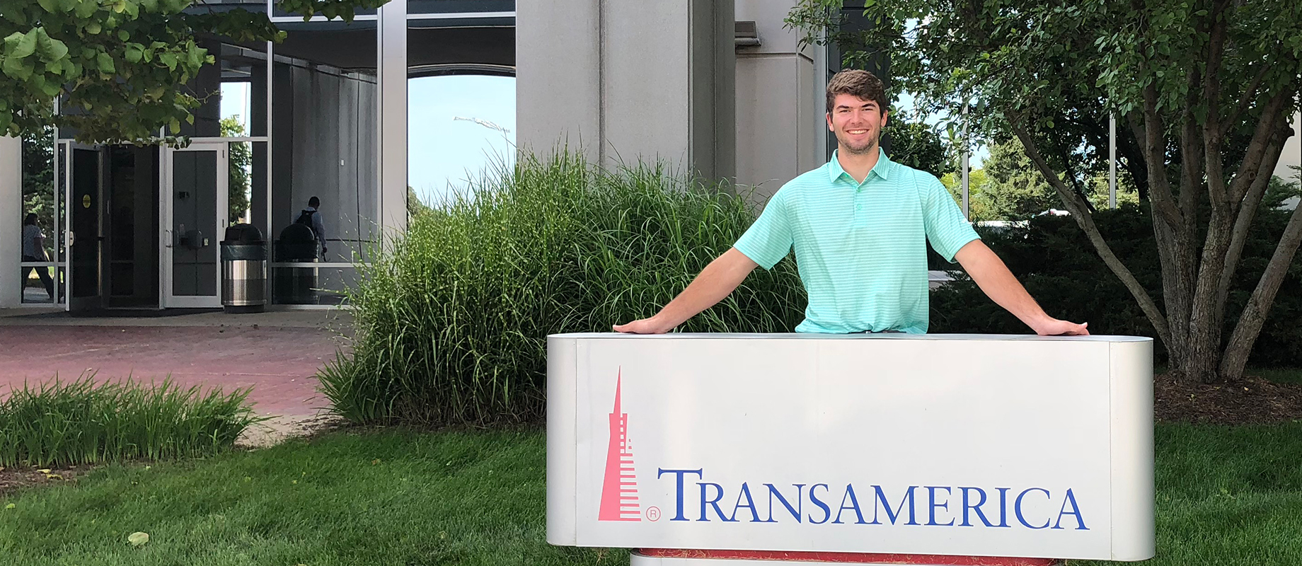 Simpson College graduate Truman Schmitt poses at Transamerica