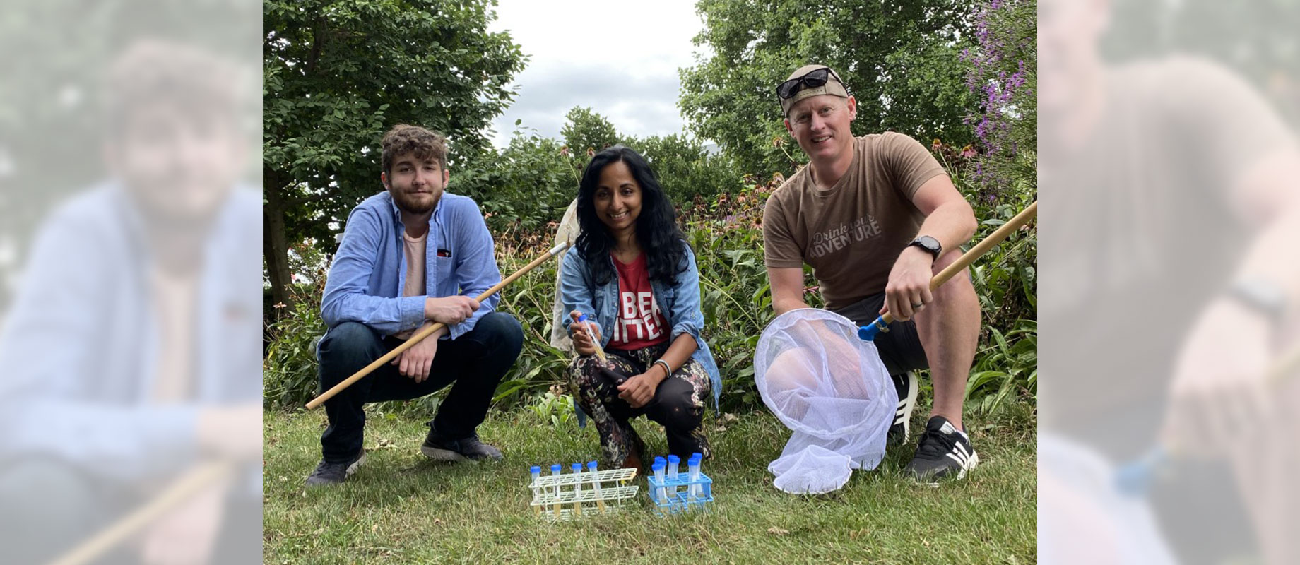 Simpson College student Ethan Madden (left), biology professor Aswati Subramanian (center) and West Hill Brewing Company owner Doug Gaumer (right) pose in a local park.