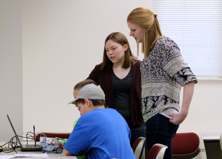 students teaching robotics
