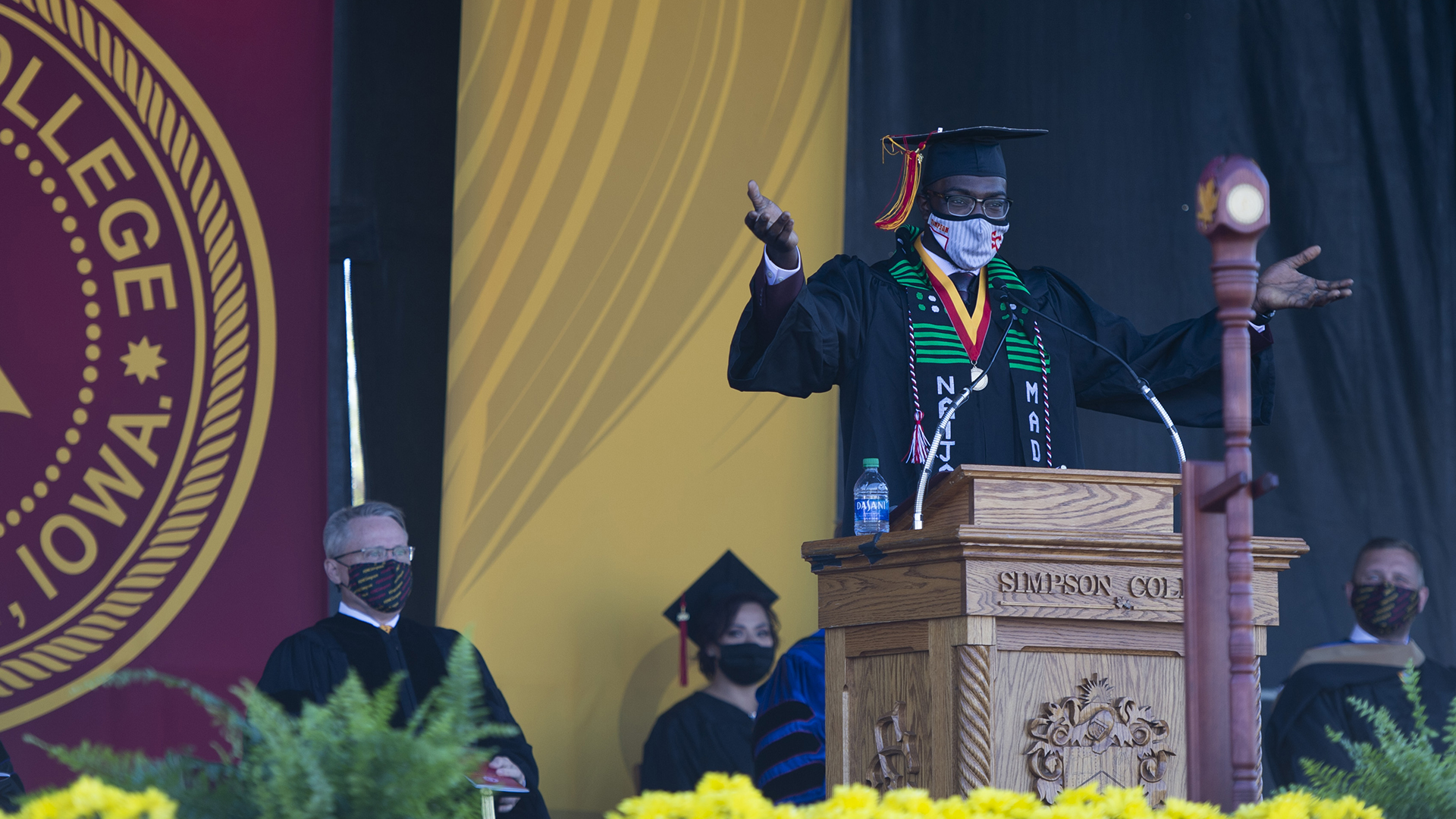 Simpson College graduate Sam Adeniyi ’20 delivers the traditional undergraduate address at the 2021 morning commencement ceremony.