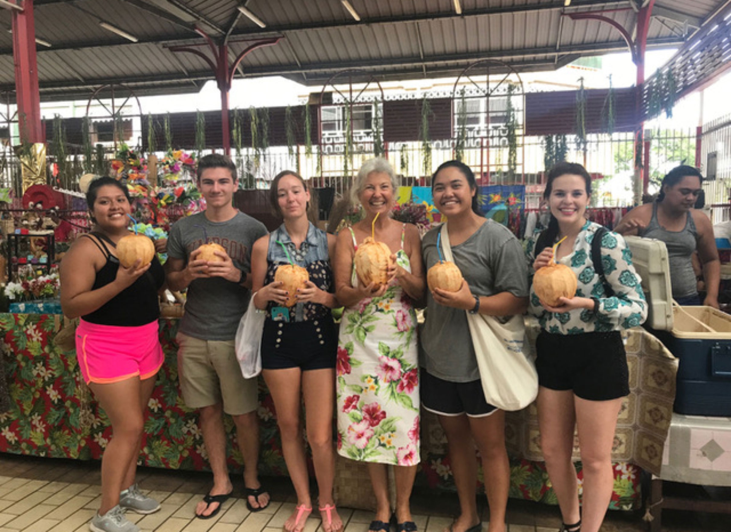 Students at the market in Tahiti